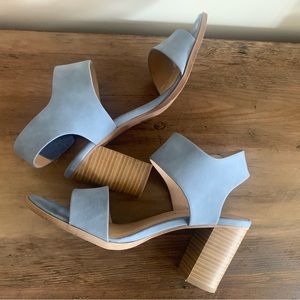 Blue open height heels.